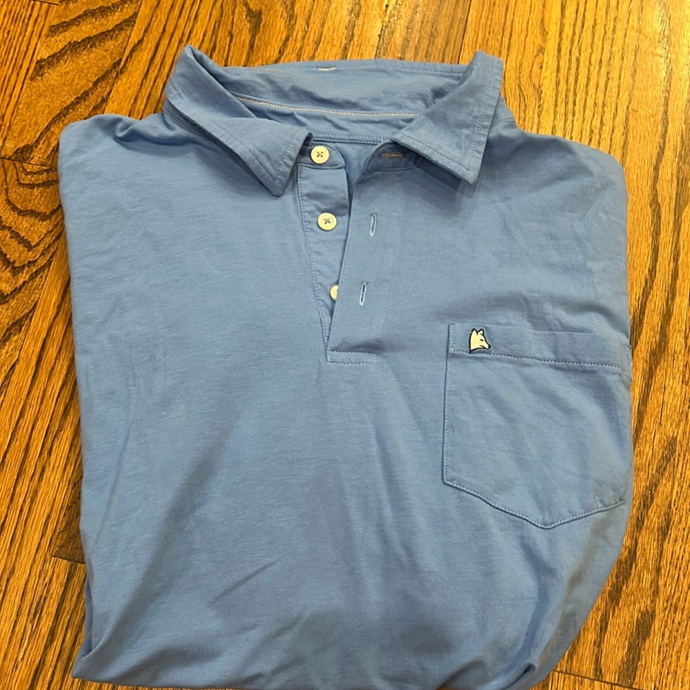 Silver fox men’s blue polo.